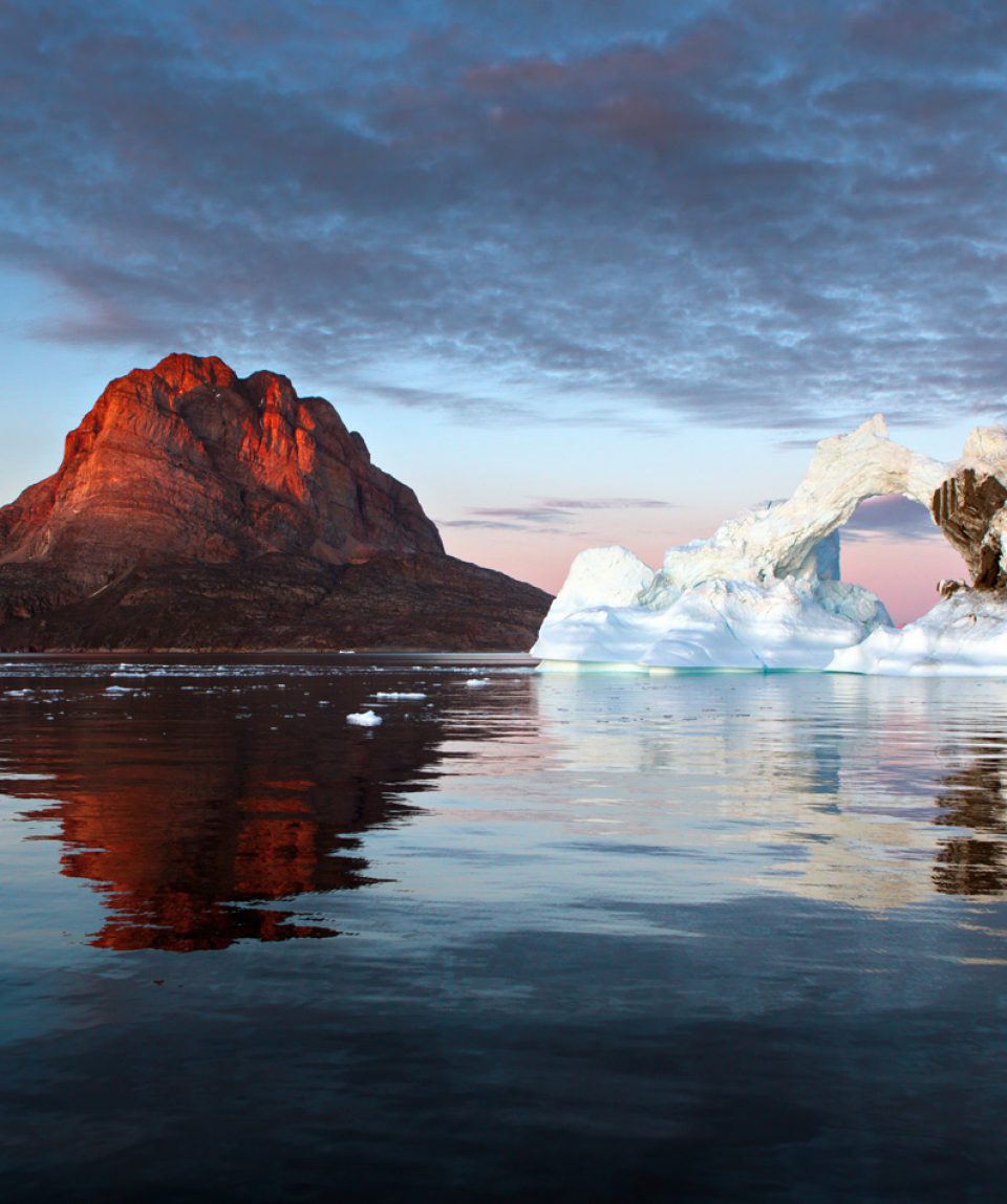 Beautiful landscape with large icebergs in the middle of the sea